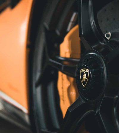 a close up of a wheel on a sports car