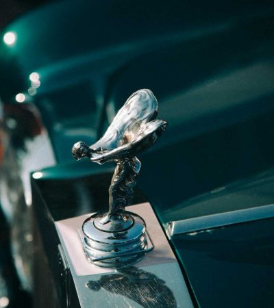 silver-colored vehicle ornament