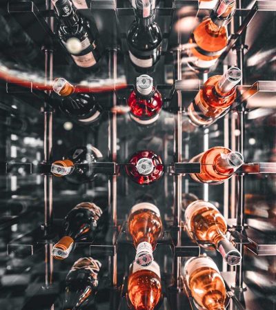 a wine cellar filled with lots of bottles of wine