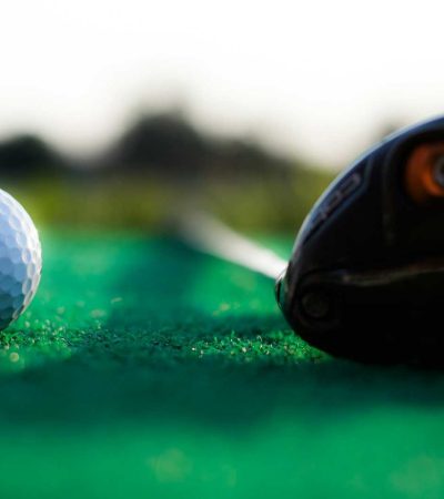 shallow focus photography of white golf ball