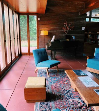blue and brown chair beside brown wooden table