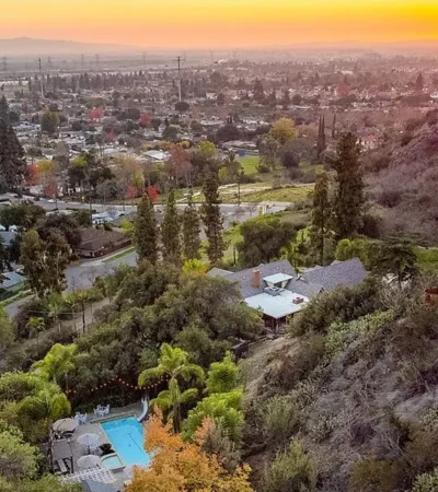a view of a city from a hill