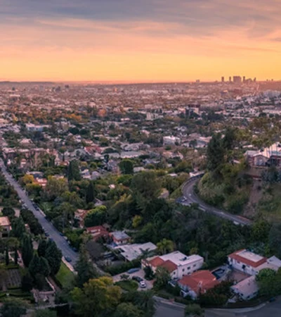 a city with a road and buildings