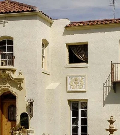 a white house with a balcony