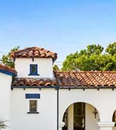 a white building with a red roof