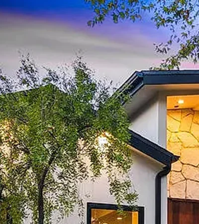 a tree next to a building