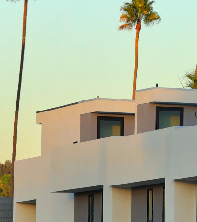 a building with palm trees