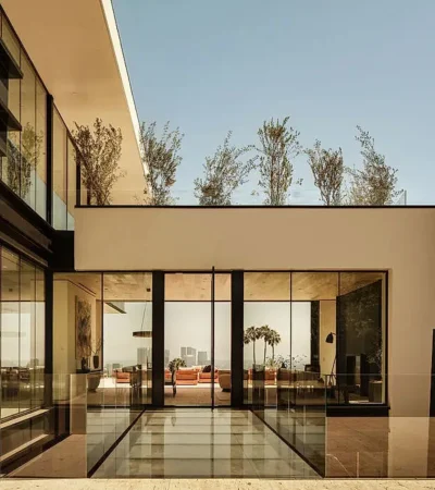 a glass building with a balcony