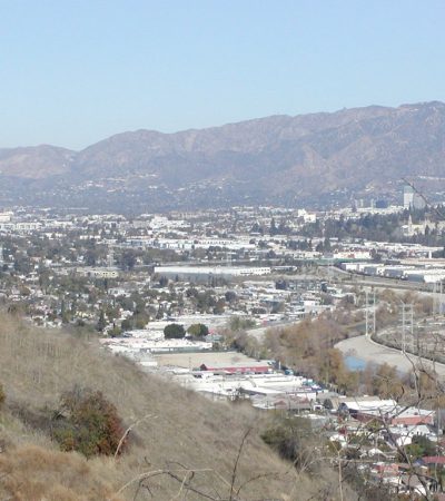 a view of a city from a hill