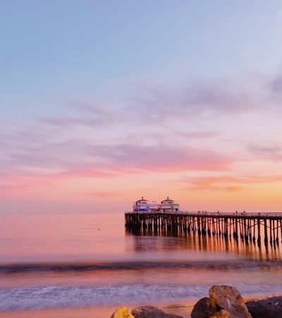 a pier that is next to a body of water