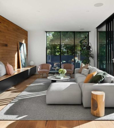 gray sectional couch on gray carpet