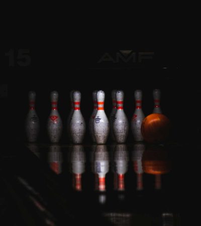 clear glass bottles on black table