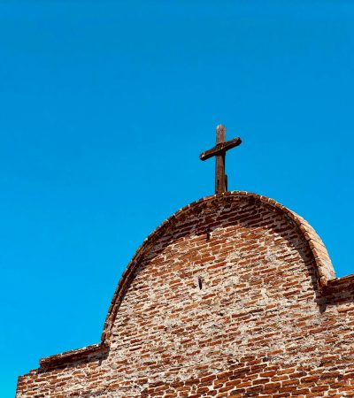 brown cross on chapel