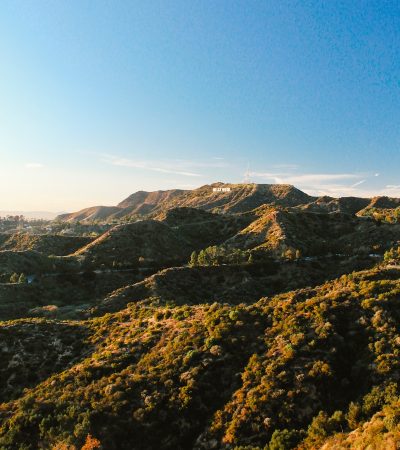 green and brown mountains under blue sky during daytime