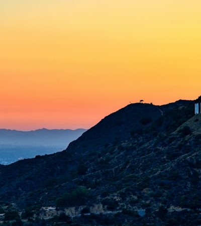 white concrete building on top of mountain during daytime