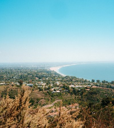 a view of the ocean from a hill top